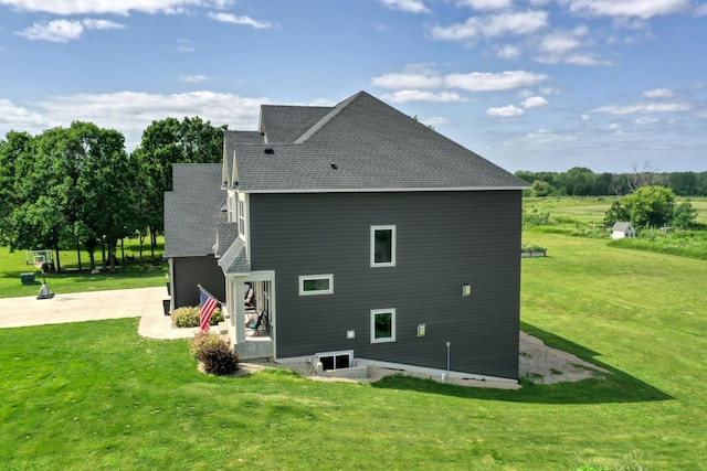 18340 Forest Rd N, Forest Lake, MN 55025 - back of house with a shingled roof, a yard, and a patio