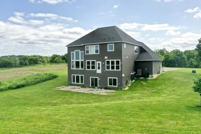 18340 Forest Rd N, Forest Lake, MN 55025 - rear view of house featuring a yard