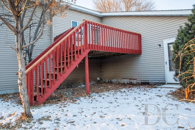 exterior space with stairway and a wooden deck