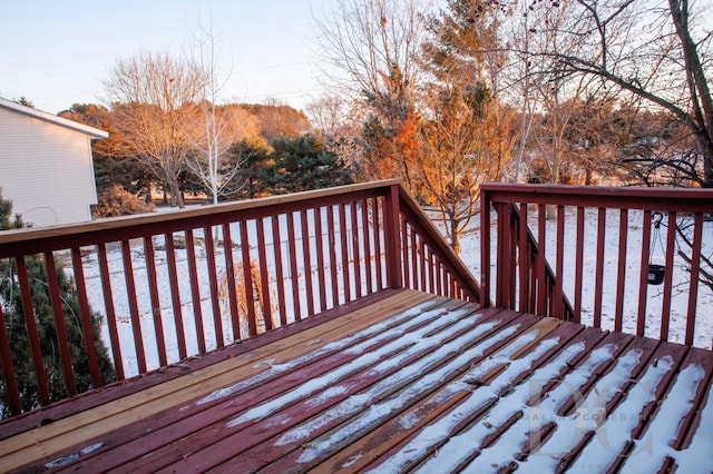 view of snow covered deck