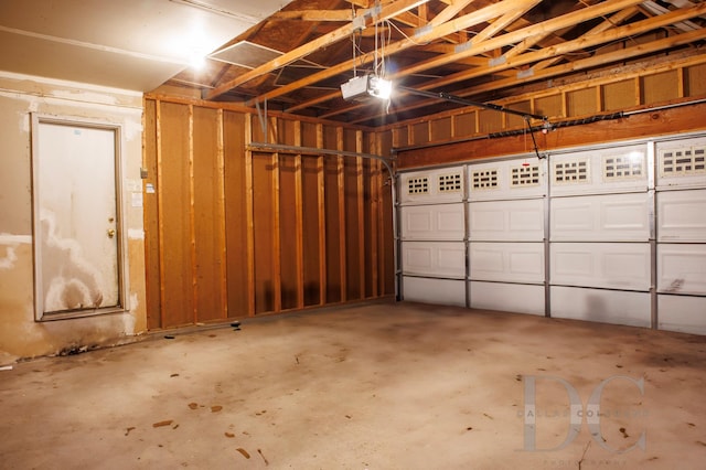 garage featuring a garage door opener