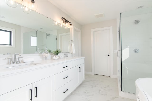 bathroom with vanity and walk in shower