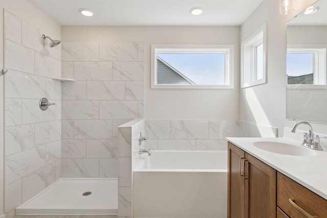 11459 Blazingstar Ln, Lake Elmo, MN 55042 - full bath with vanity, tiled shower, and a garden tub