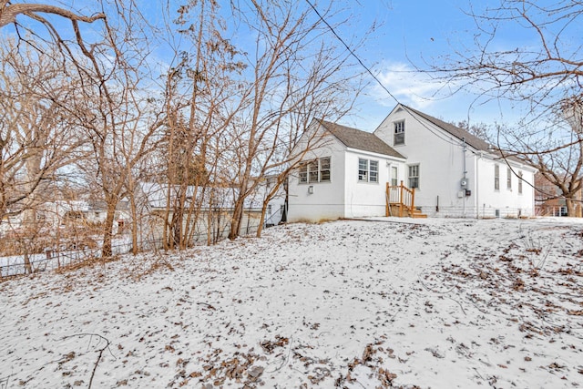 view of snow covered property