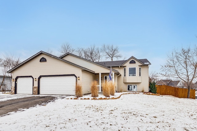 view of front of property with a garage