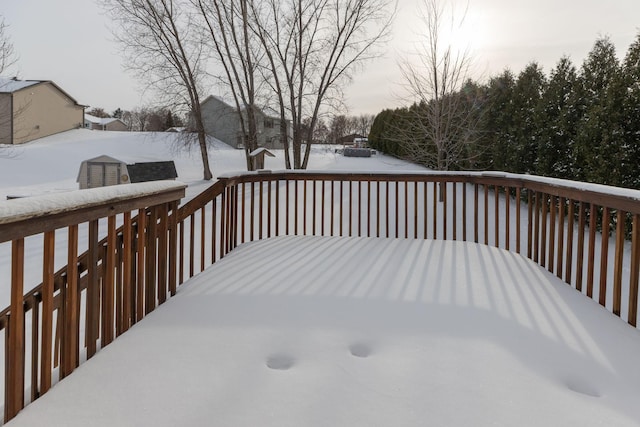 view of snow covered deck