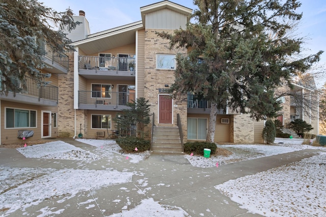 view of snow covered property