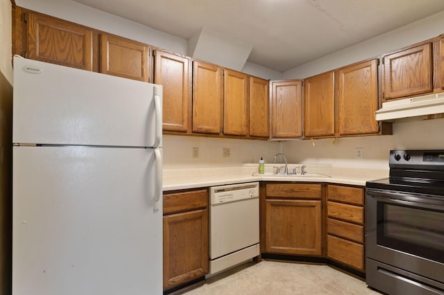 kitchen featuring sink and white appliances