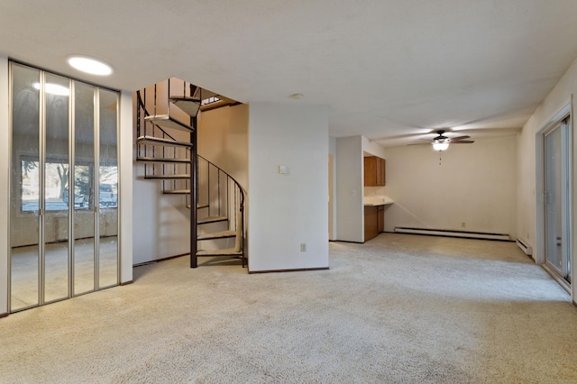 unfurnished living room featuring light carpet, a baseboard radiator, and ceiling fan