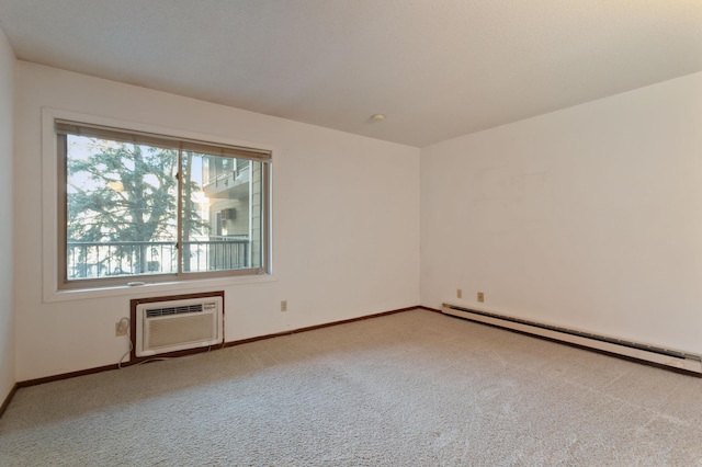 carpeted empty room with a wall unit AC and a baseboard radiator