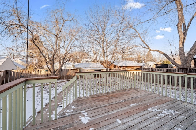 view of snow covered deck