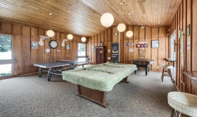 game room with a wealth of natural light, wooden walls, wood ceiling, and lofted ceiling