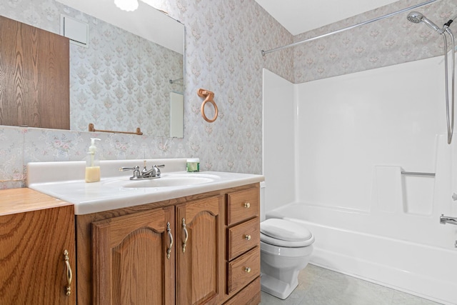 full bathroom with shower / bathing tub combination, tile patterned flooring, vanity, and toilet