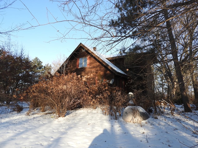 view of snow covered property