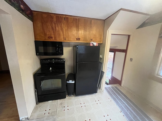 kitchen with black appliances