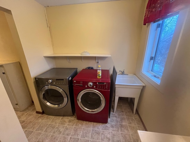 laundry area featuring washer and clothes dryer