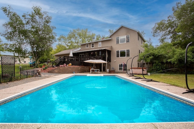 view of pool featuring a wooden deck