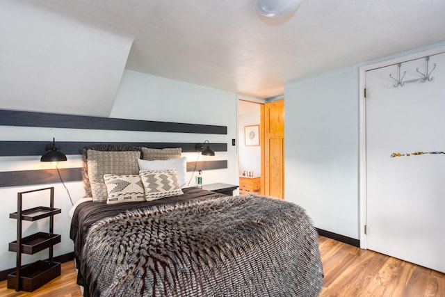 bedroom featuring light wood-type flooring