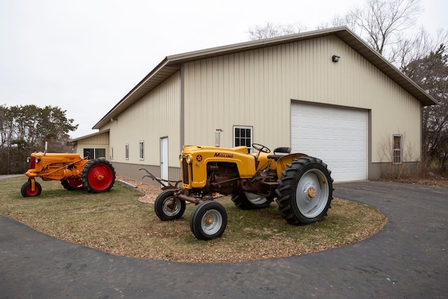 view of property exterior with a garage