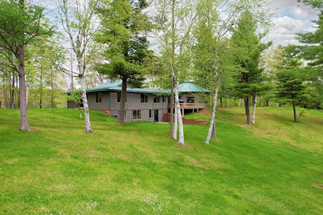 view of yard with a wooden deck