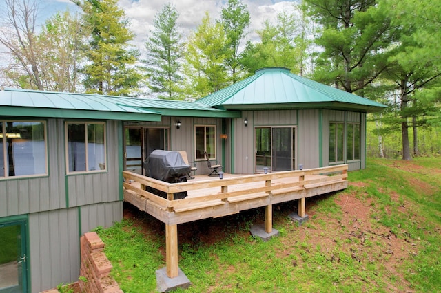 rear view of house with a deck