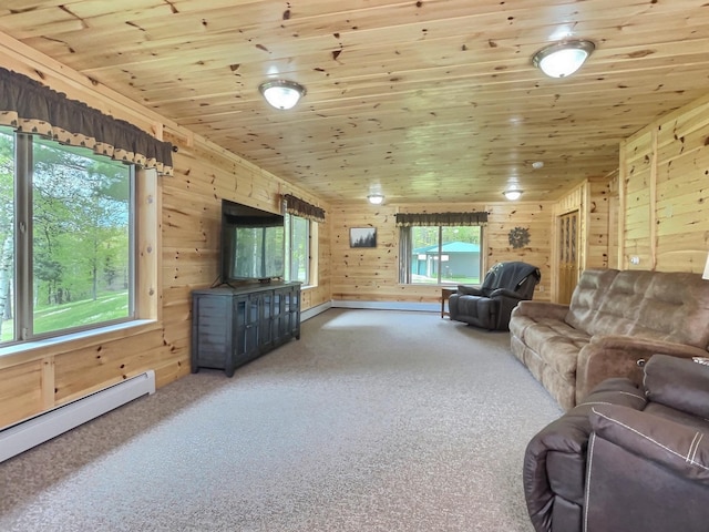 carpeted living room with wood ceiling, wooden walls, and a baseboard radiator