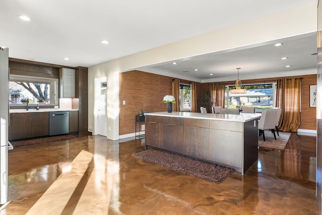 kitchen featuring a kitchen island, dishwasher, light countertops, recessed lighting, and modern cabinets