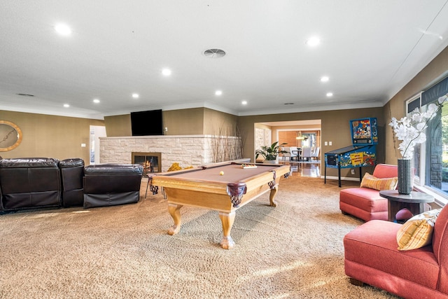 game room with billiards, recessed lighting, a stone fireplace, crown molding, and carpet flooring