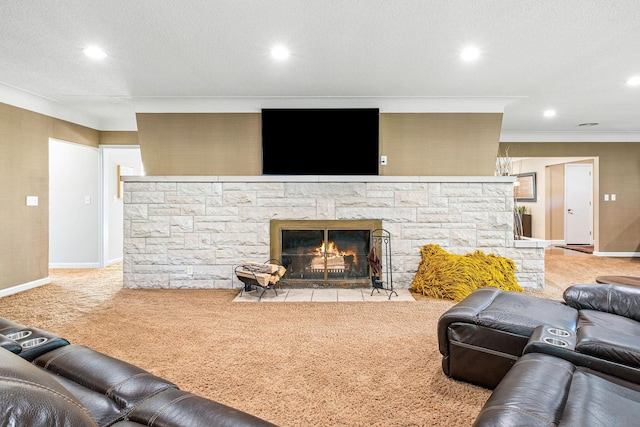 carpeted living room featuring recessed lighting, a textured ceiling, and a fireplace