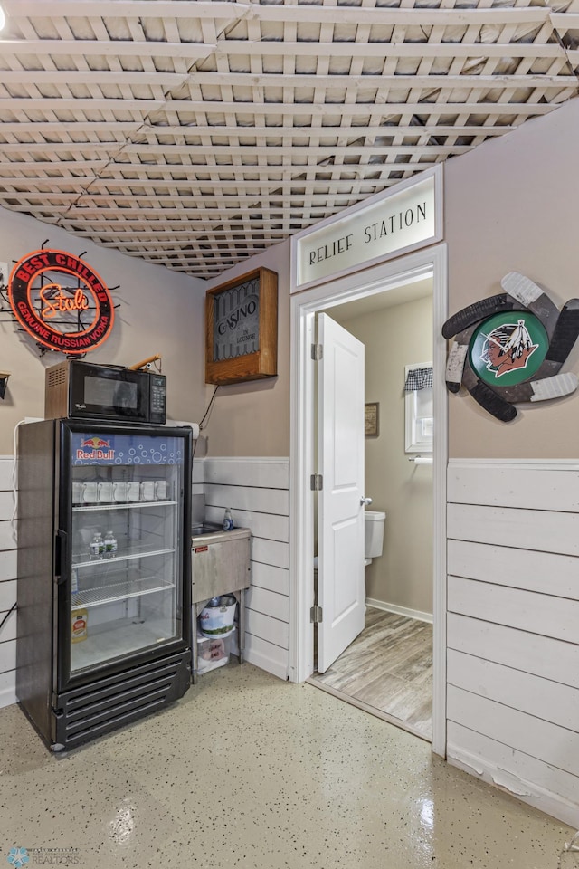 interior space featuring black fridge