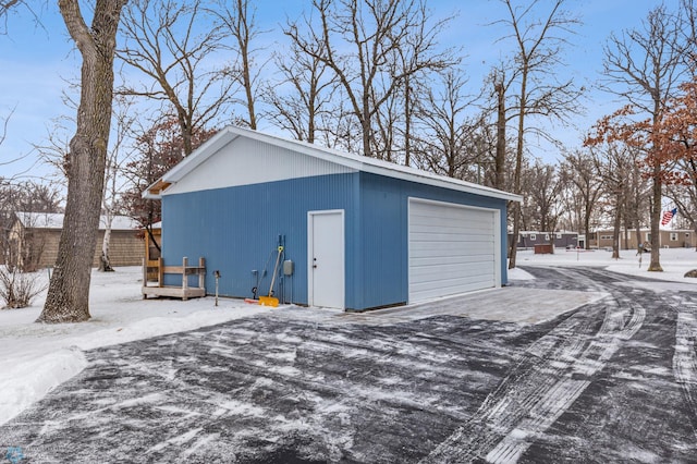 view of snow covered garage