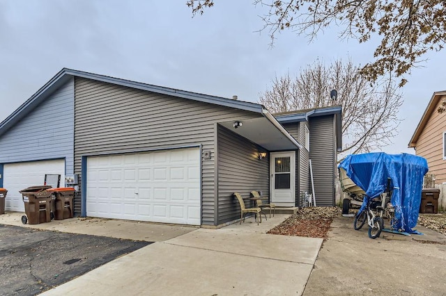 view of front of property with a garage