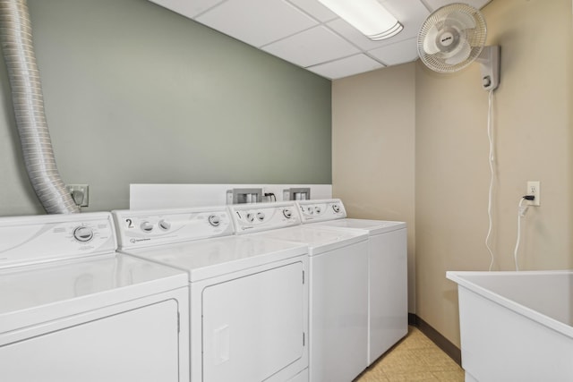 washroom featuring sink and washer and clothes dryer