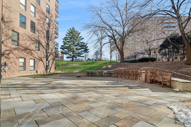 surrounding community with a patio area