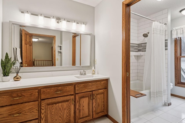 full bathroom with toilet, shower / tub combo with curtain, a textured ceiling, tile patterned flooring, and vanity