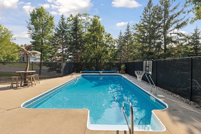 view of pool featuring a fenced in pool, a patio, and fence