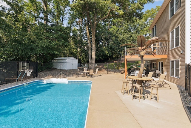 view of swimming pool with a fenced in pool, a patio, and a fenced backyard