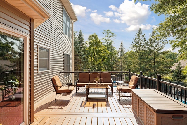 wooden deck with outdoor lounge area