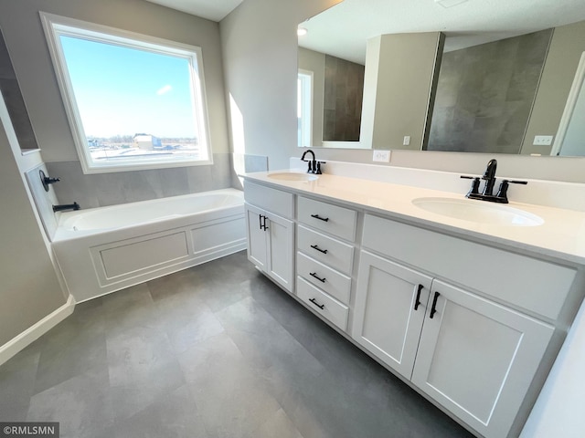 bathroom with a bathtub and vanity