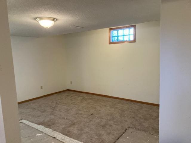 basement with a textured ceiling