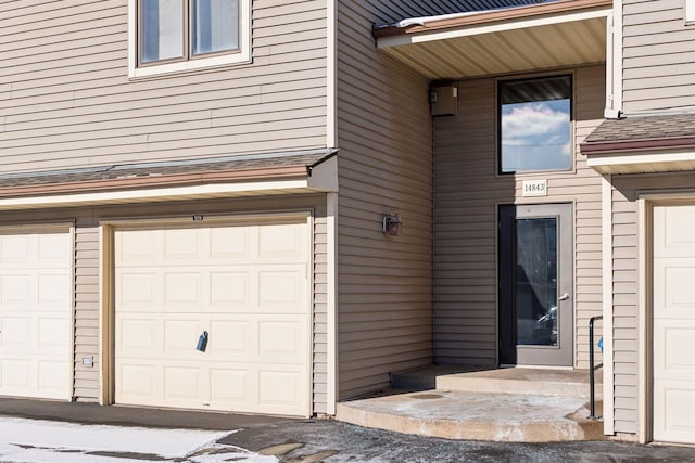 entrance to property with a garage