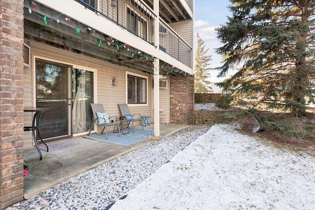 view of patio with a balcony