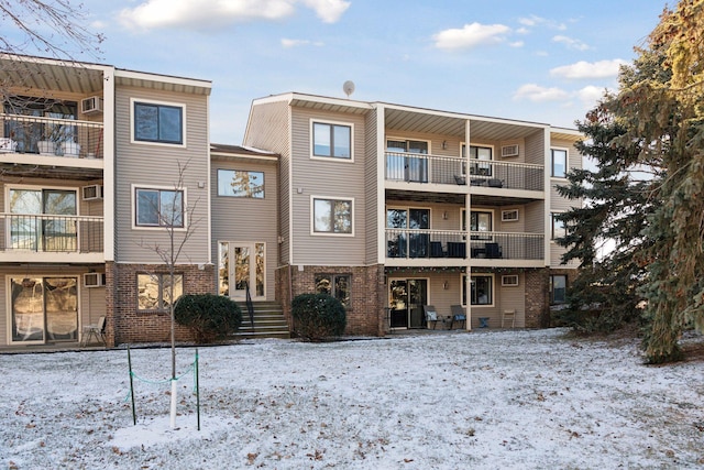 view of snow covered property