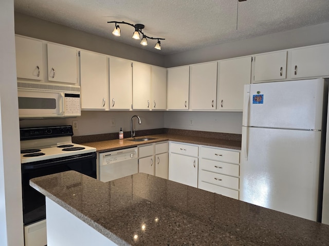 kitchen with white cabinetry, sink, white appliances, and a textured ceiling