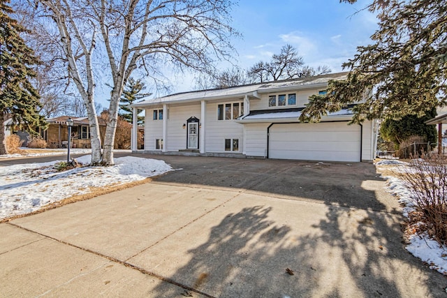 split foyer home featuring a garage