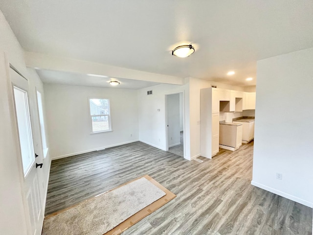 unfurnished room featuring light hardwood / wood-style flooring