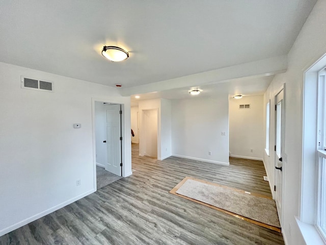 unfurnished room with light hardwood / wood-style flooring