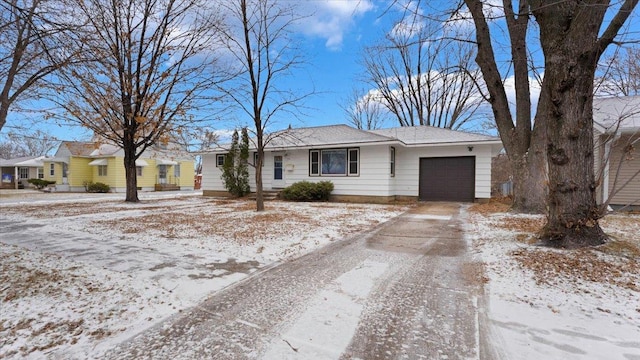 ranch-style home with a garage