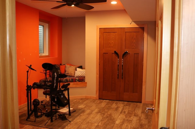 foyer featuring hardwood / wood-style floors and ceiling fan