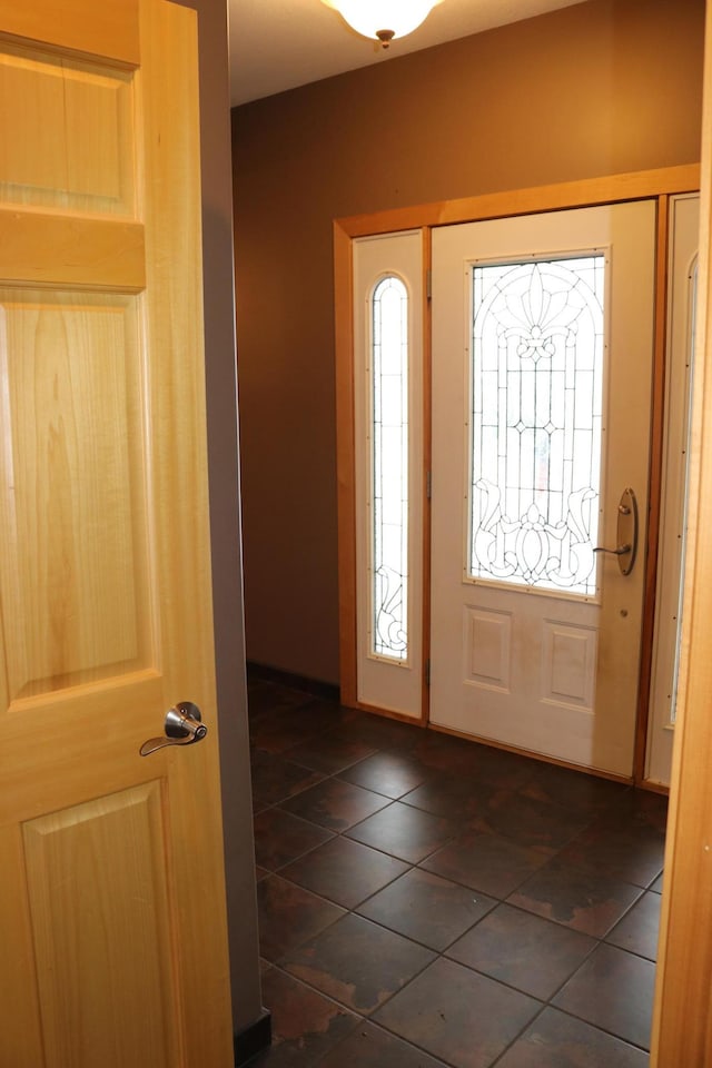 view of tiled foyer entrance